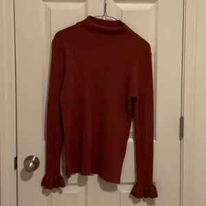 Rust-colored sweater